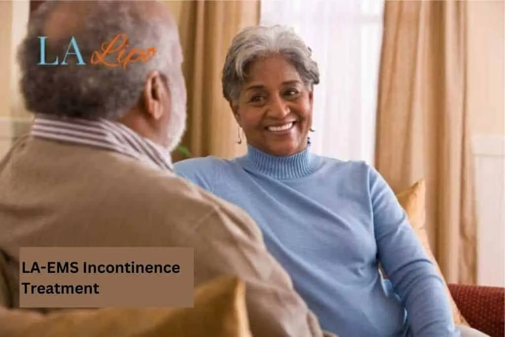 Couple sat smiling at each other - LA-EMS treatment Chester