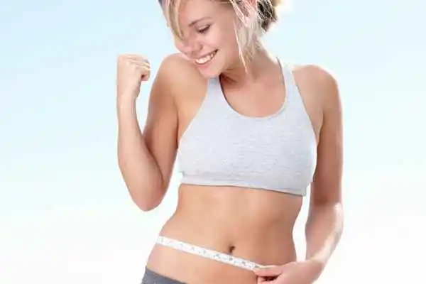 woman happy after fat reduction treatment Chester